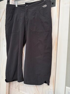 North Face size 12 Black activewear shorts, capris for hiking and outdoor fun.